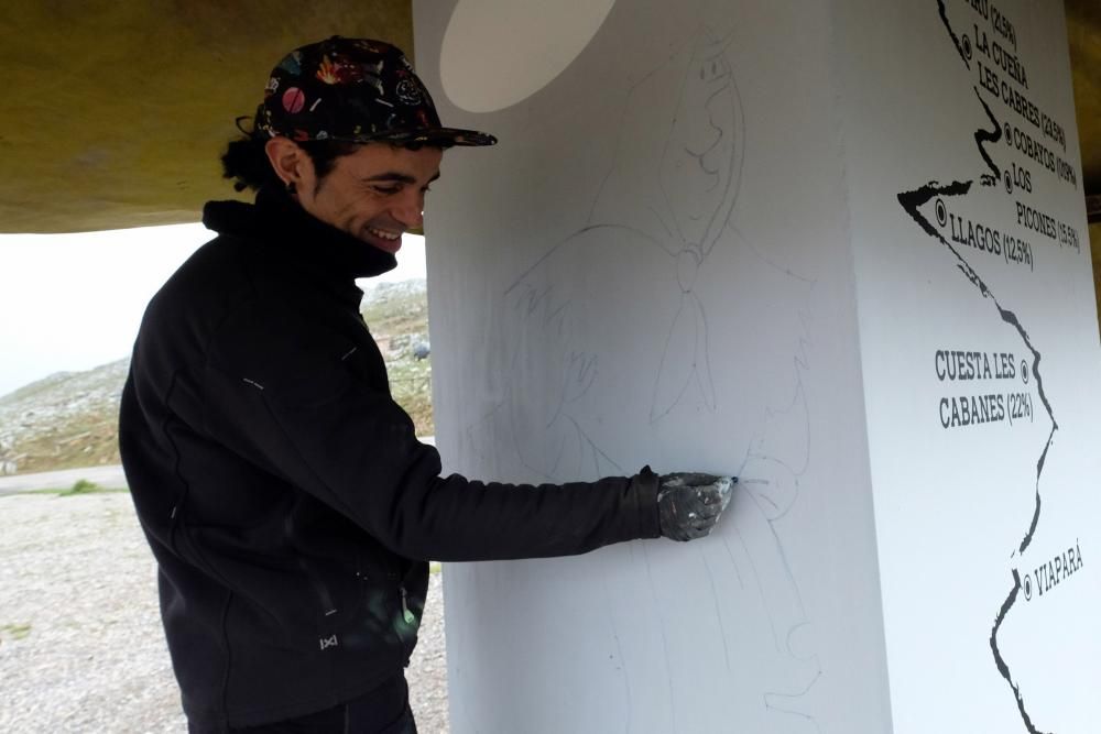 Trabajo de pintura en el monolito de la cima Angli