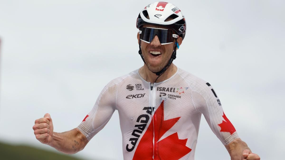 Michael Woods celebrates his latest victory in the Vuelta a España