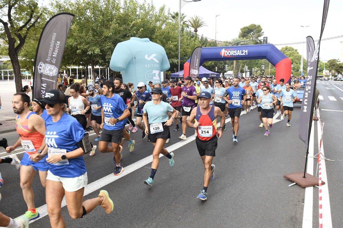 La carrera y marcha Solidaria Asteamur, en imágenes