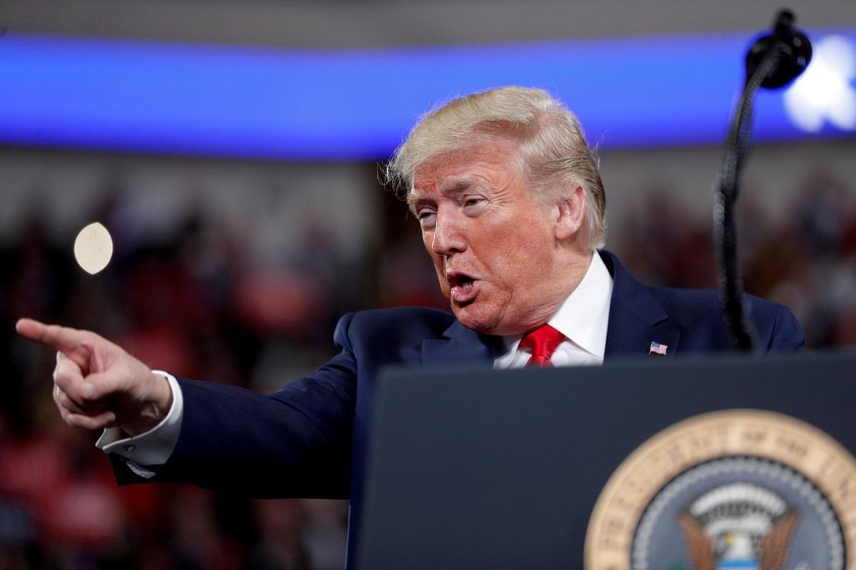 FILE PHOTO: U.S. President Donald Trump delivers remarks during a campaign rally at the Giant Center in Hershey, Pennsylvania, U.S., December 10, 2019.  REUTERS/Tom Brenner/File Photo