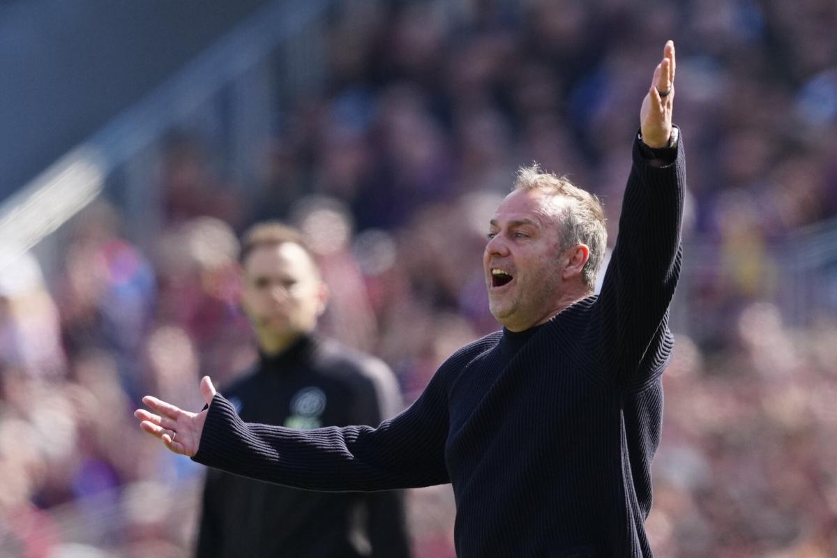 FC Barcelona's head coach Hansi Flick reacts during a LaLiga EA Sports league game against Rayo Vallecano at Camp Nou Stadium, in Barcelona, northeastern Spain, 22 March 2026. EFE/Alejandro Garcia