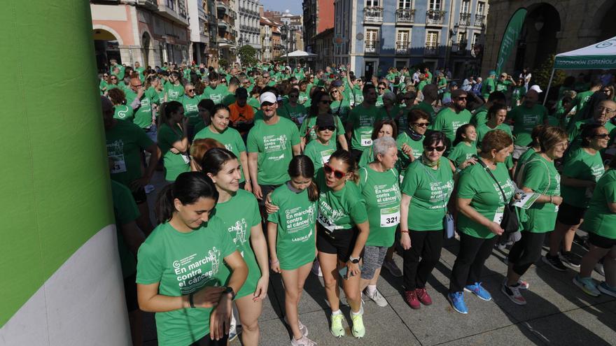 EN IMAGENES: La &quot;marea verde&quot; de la marcha contra el cáncer de Avilés