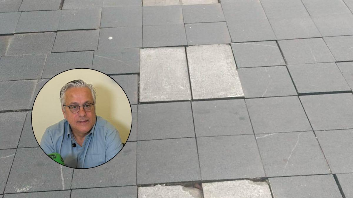 Detalle del pavimento de la avenida de Extremadura, con baldosas deterioradas.