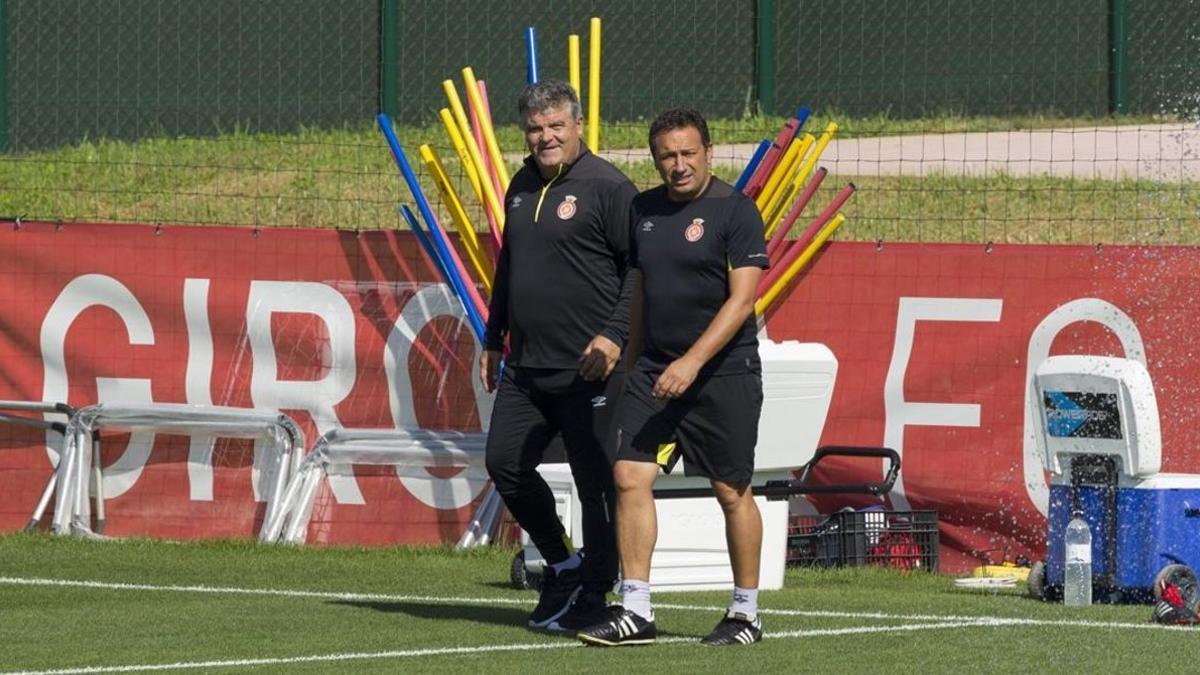 Onésimo y Eusebio, el tándem técnico del Girona, en un entrenamiento.