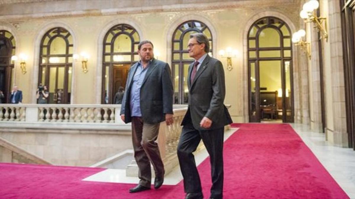 Entente independentista 8 Oriol Junqueras y Artur Mas, a la salida del despacho del 'president' en el Parlament, el pasado noviembre.