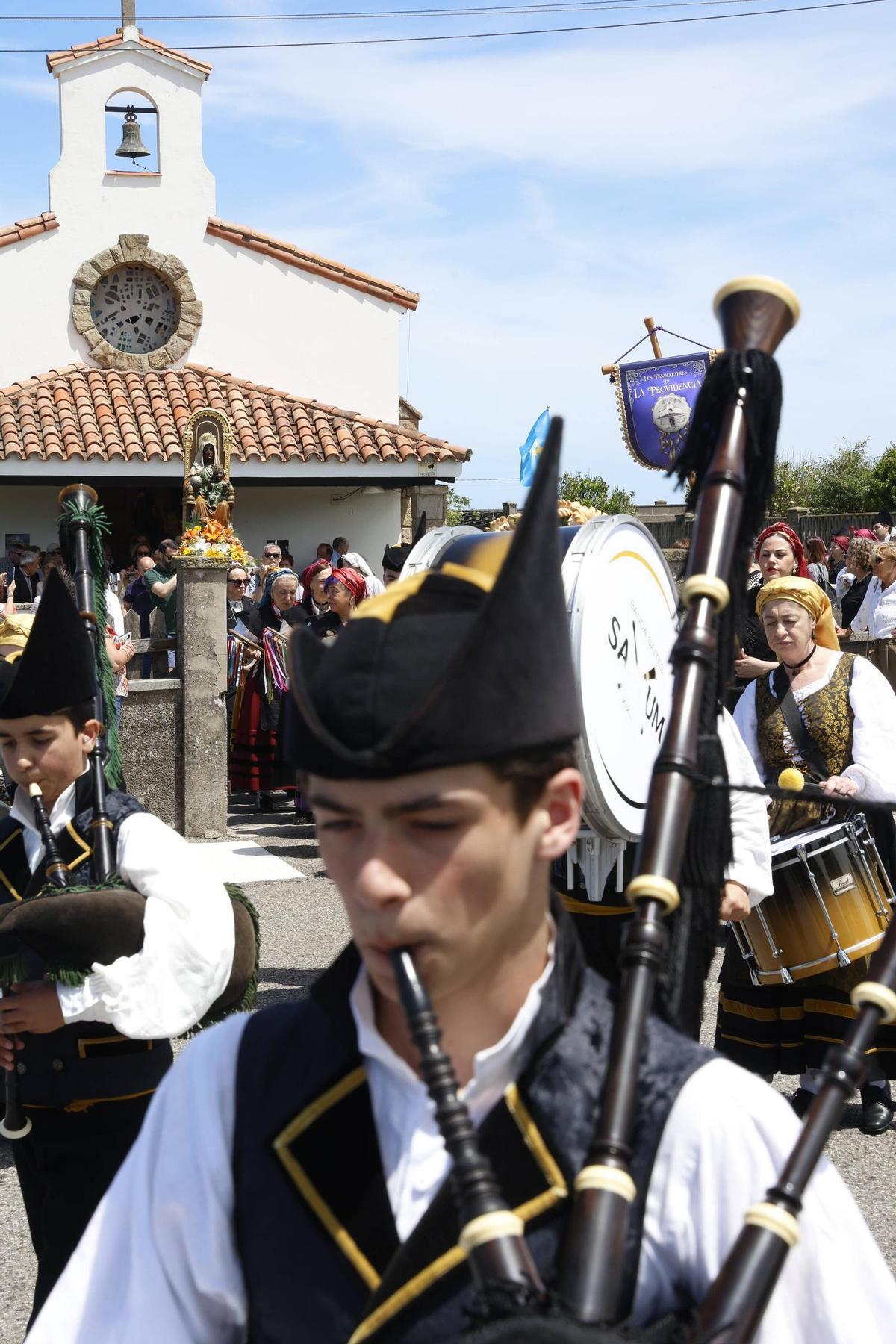 La procesión de la Virgen de La Providencia en Gijón, en imágenes