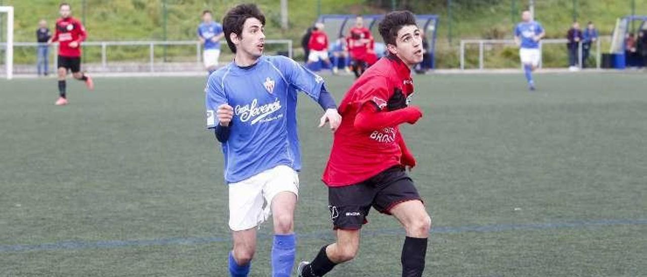 Una acción del partido entre el Versalles y el Navia.