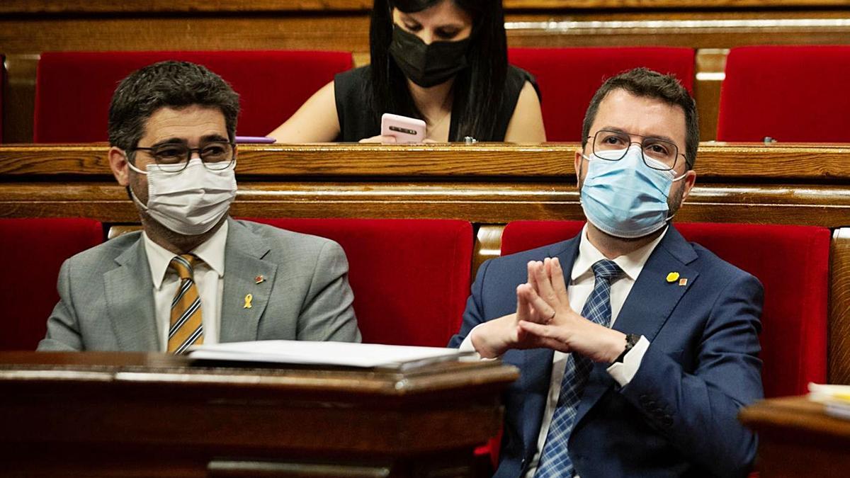 Jordi Puigneró i Pere Aragonès, en una sessió al Parlament | EP/ARXIU