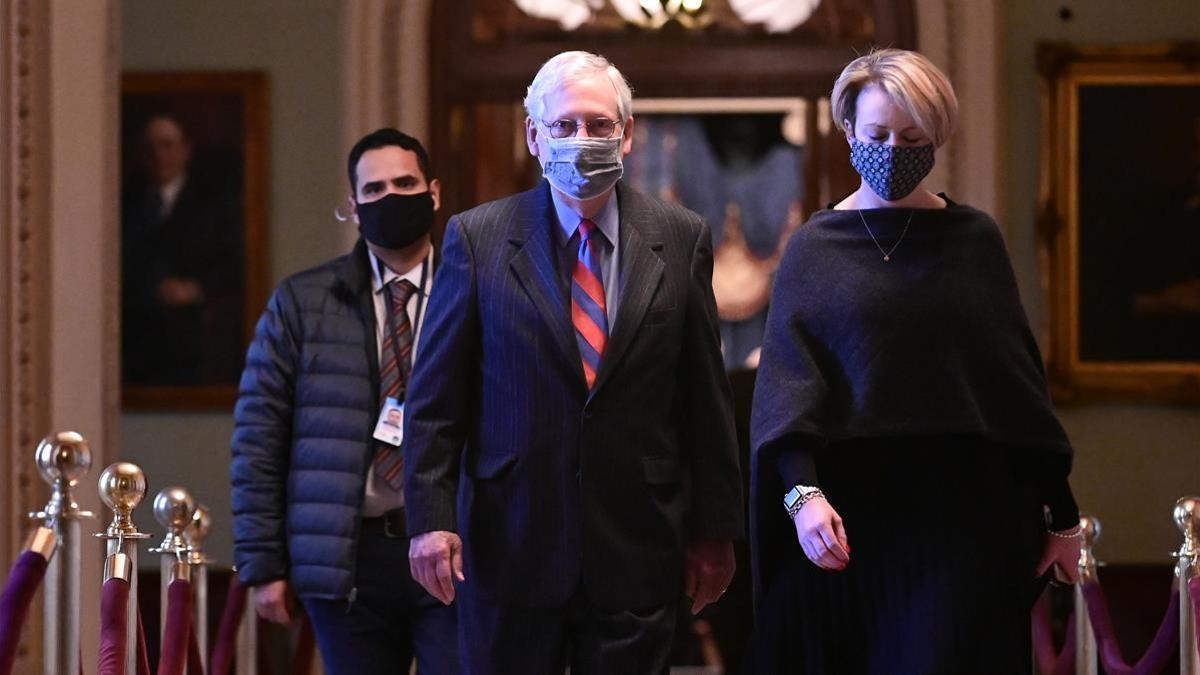 U S  Senate Majority Leader Mitch McConnell (R-KY) walks through the U S  Capitol in Washington  U S   December 17  2020  REUTERS Erin Scott