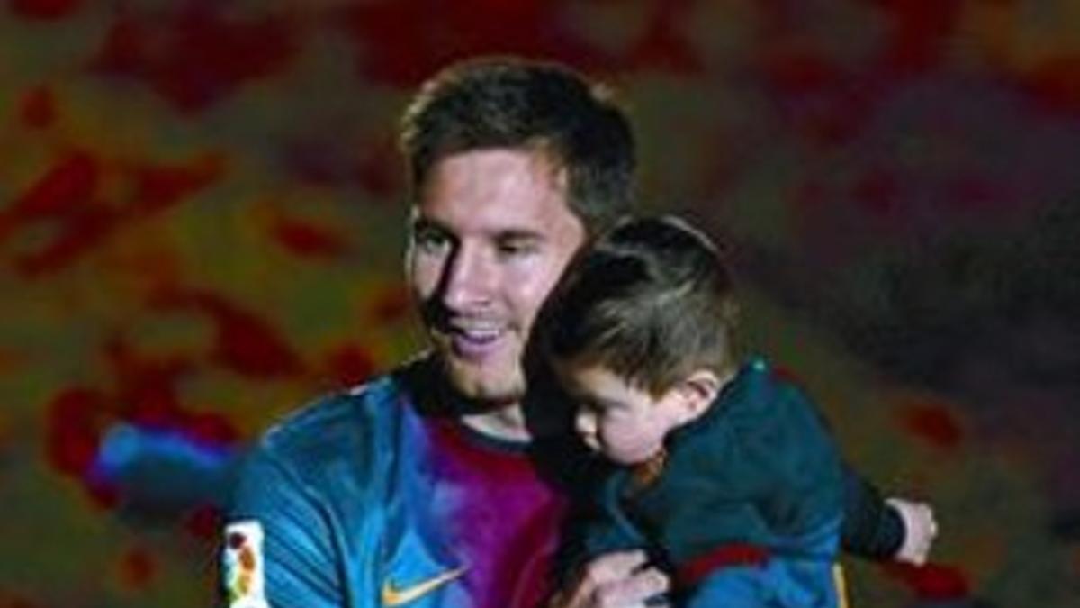 Celebración 8 Leo y su hijo Thiago festejan la última Liga.