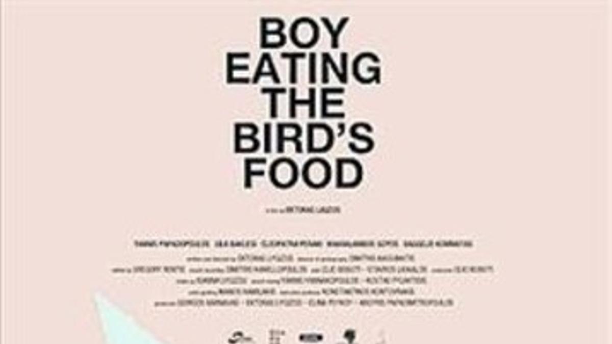 Boy eating the bird's food La metáfora del alpiste_MEDIA_2