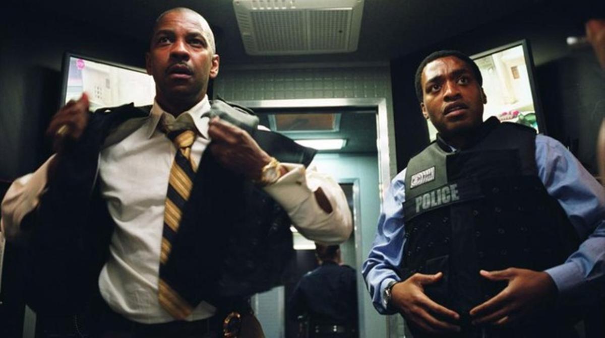 Denzel Washington (esquerra) i Chiwetel Ejiofor, a ’Plan oculto’. Denzel Washington (esquerra) i Chiwetel Ejiofor, a ’Plan oculto’.