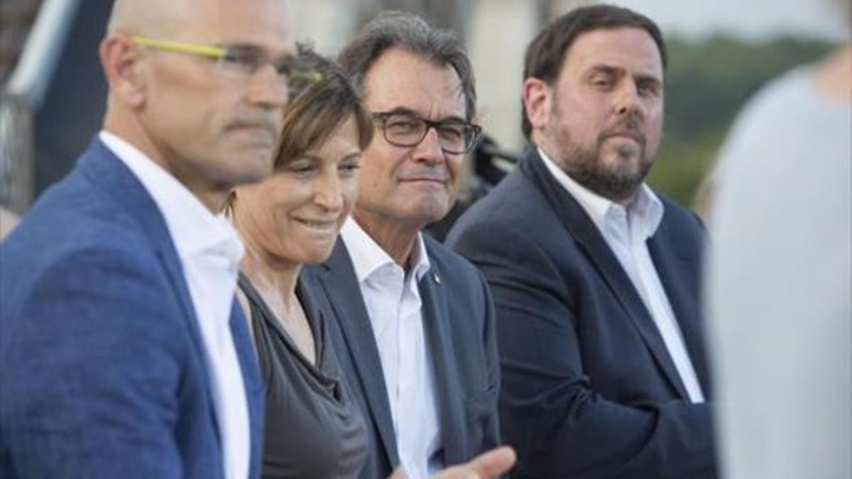 Raül Romeva, Carme Forcadell, Artur Mas y Oriol Junqueras, en la presentación de Junts pel Sí.