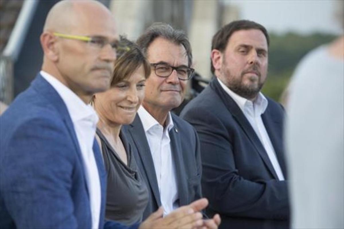 Raül Romeva, Carme Forcadell, Artur Mas y Oriol Junqueras, en la presentación de Junts pel Sí.