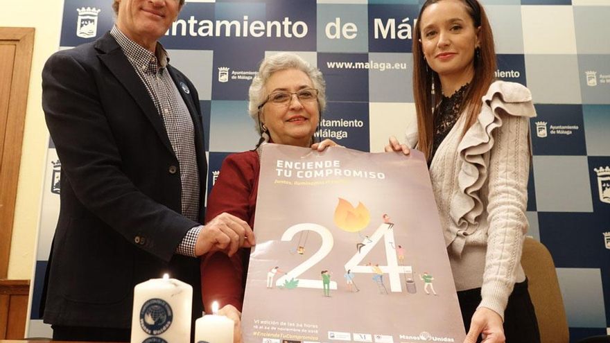 Representantes del Ayuntamiento y Manos Unidas.