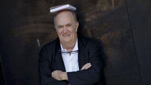 Irish writer Colm Toibin presents his book Homenaje a Barcelona (Homage to Barcelona,) originally published in english in 1990 and translated into Catalan in 2003, which he now republishes alongside a Spanish version. EFE/Toni Albir