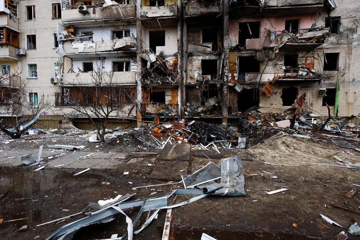 A residential building is damaged, after Russia launched a massive military operation against Ukraine, in Kyiv