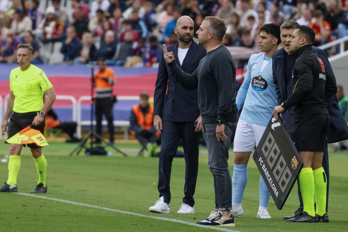 Claudio y Flick, durante el último Barcelona-Celta.