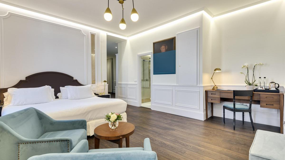 Una suite moderna y cómoda donde poder descansar y desconectar