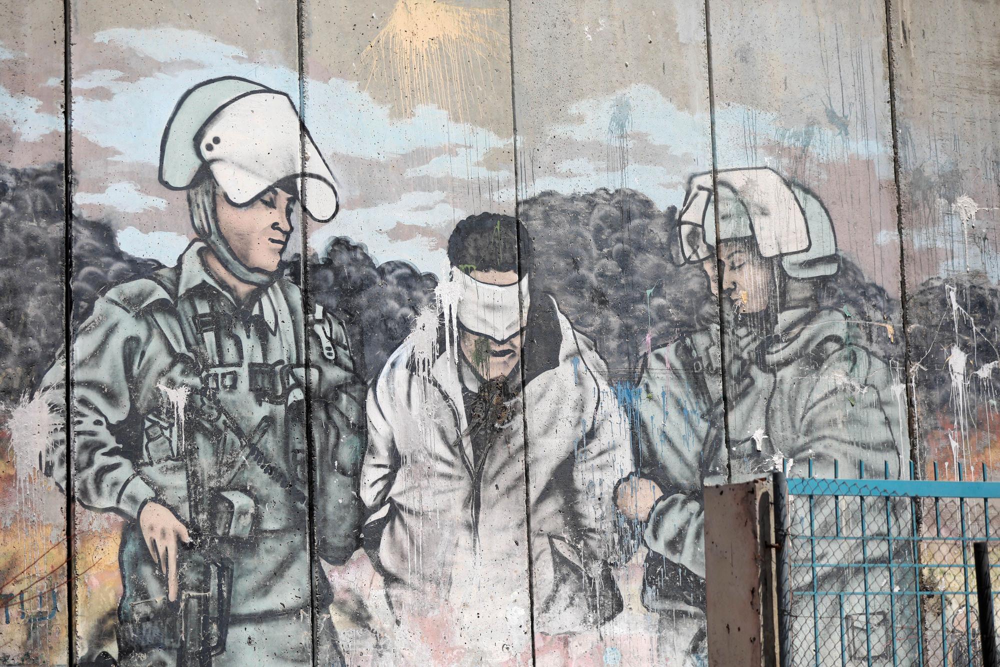 Imagen de un grafiti sobre el muro de separación levantado por Israel