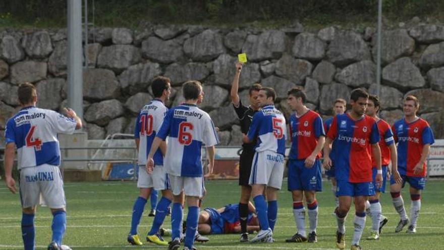 Una acción del Tuilla-Langreo de hace un año en El Candín.