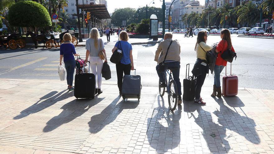 Un grupo de turistas en Málaga capital.