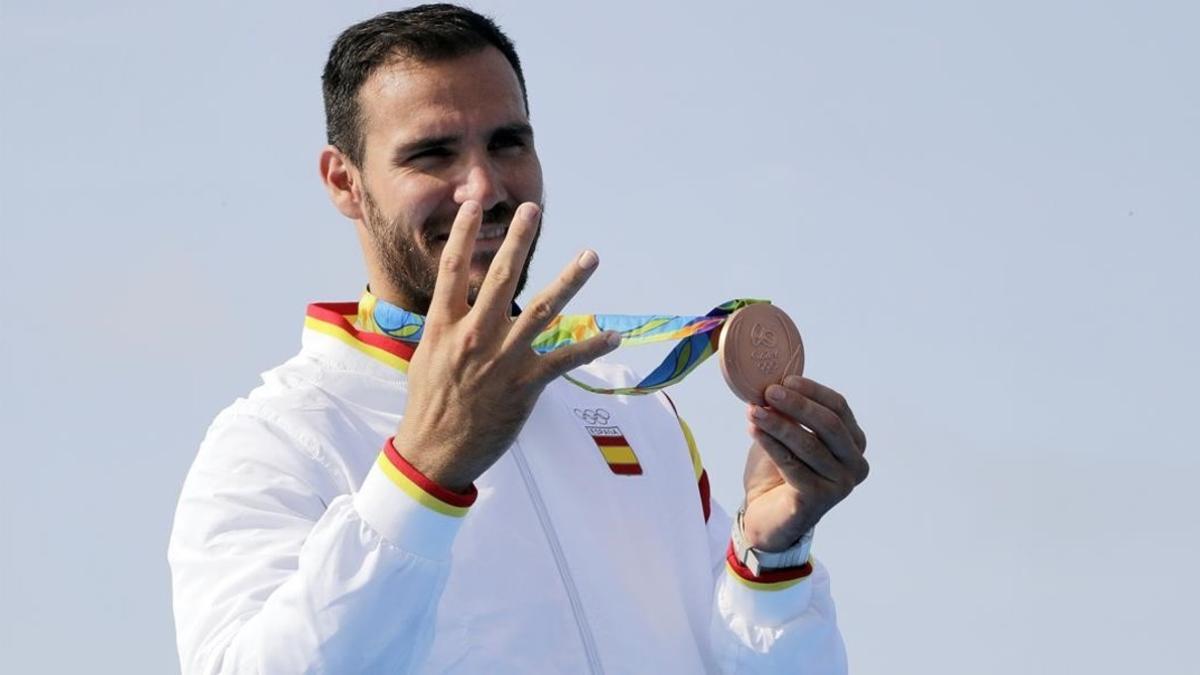 aguasch35233231 spain s saul craviotto celebrates his bronze medal in the me160820200843