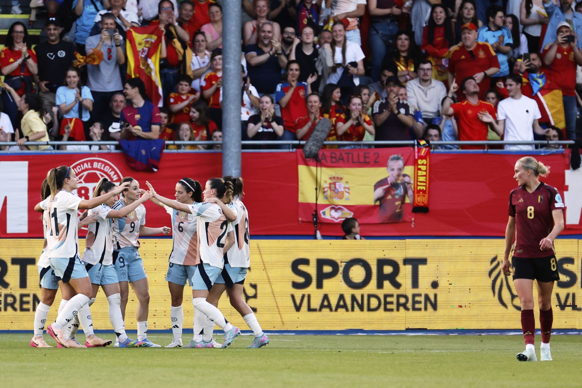 Spain's Esther Gonzalez, center left, celebrates with teammates after scoring the opening goal during the League A group A3 Women's Nations League soccer match between Belgium and Spain at Den Dreef Stadium in Leuven, Belgium, Friday, May 30, 2025. (AP Photo/Geert Vanden Wijngaert)