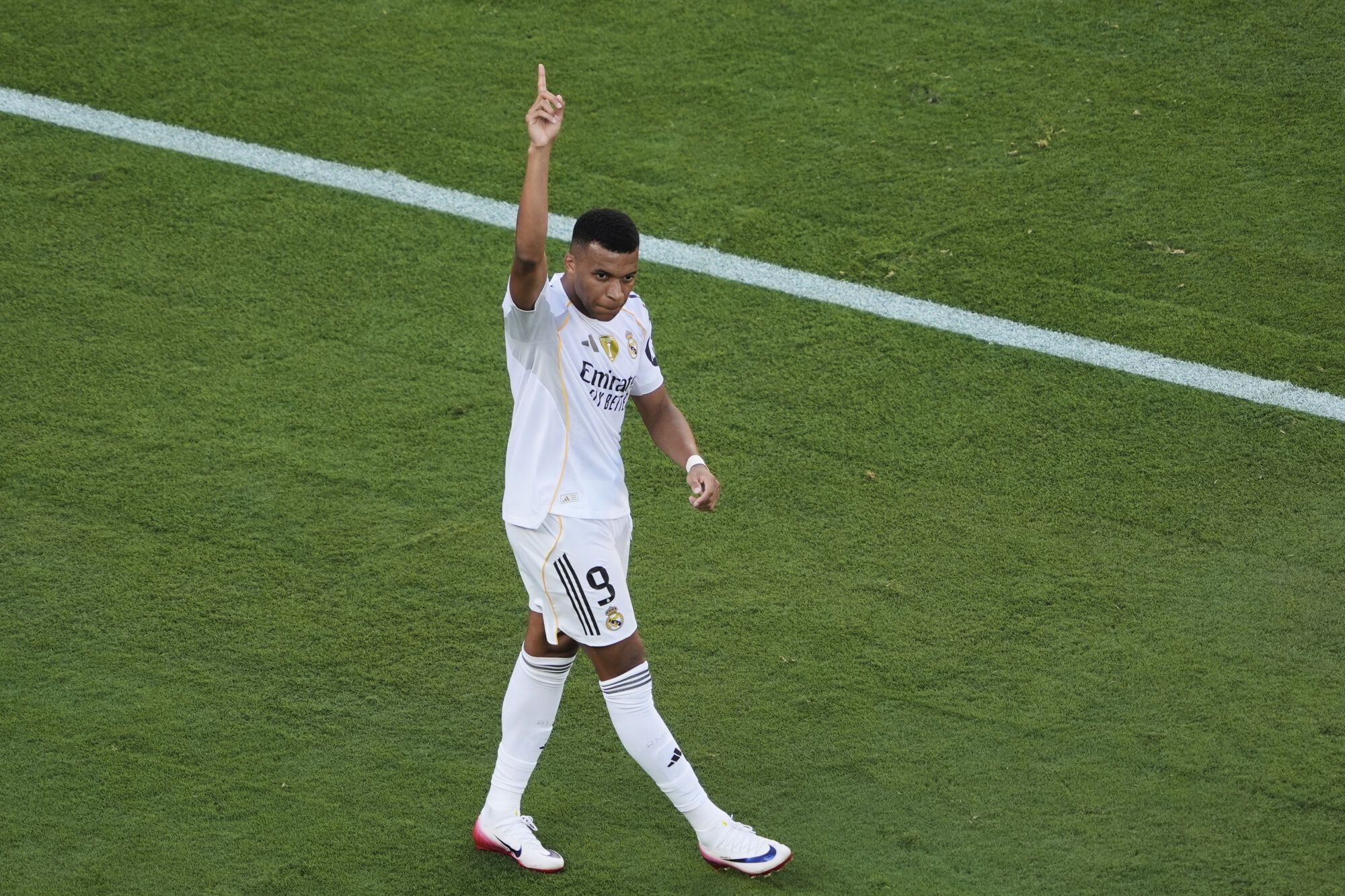 Real Madrid's Kylian Mbappe celebrates scoring his side's 3rd goal during the Club World Cup quarterfinal soccer match between Real Madrid and Borussia Dortmund in East Rutherford, N.J., Saturday, July 5, 2025. (AP Photo/Pamela Smith)