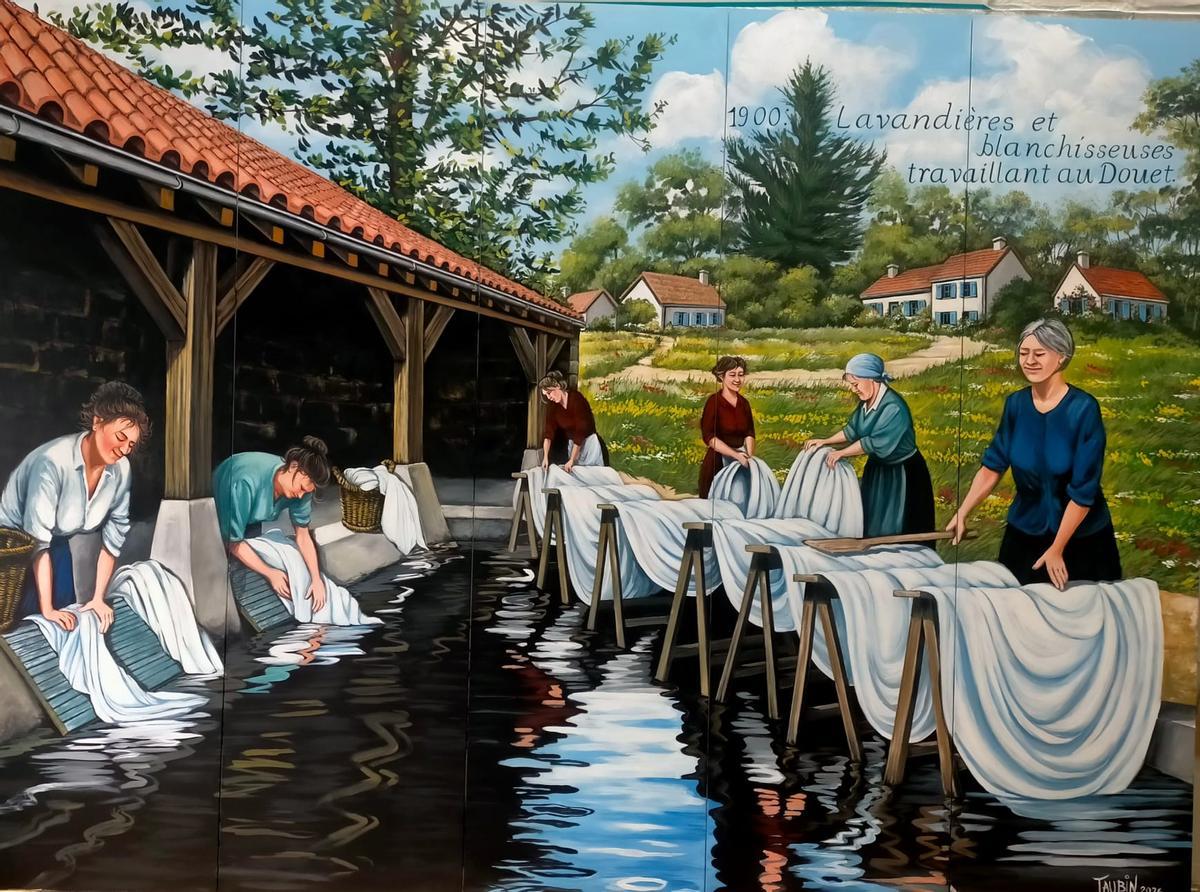 El mural de Diana Taubin que recorda a les dones que rentaven i emblanquien la roba al rentador del barri de Le Douet.