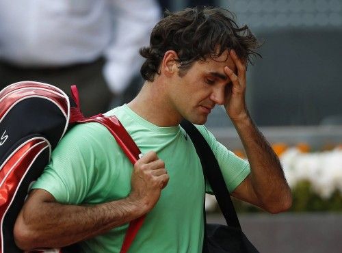 Federer abandona la pista tras caer derrotado en el Open de Madrid
