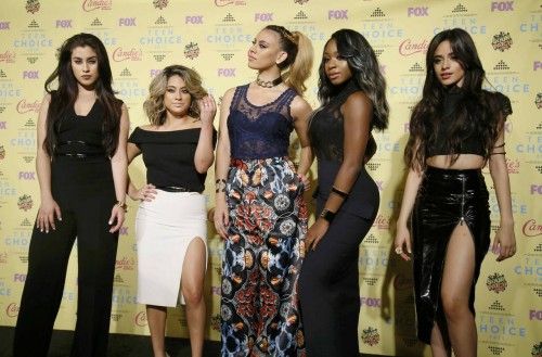 The group Fifth Harmony poses backstage at the 2015 Teen Choice Awards in Los Angeles