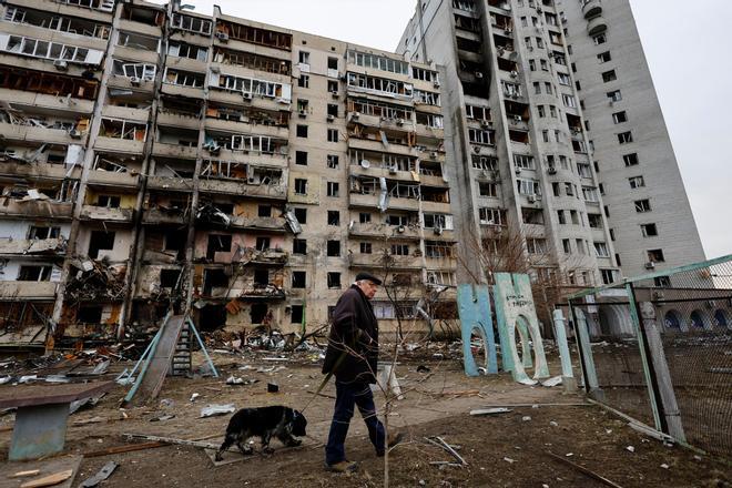 A residential building is damaged, after Russia launched a massive military operation against Ukraine, in Kyiv