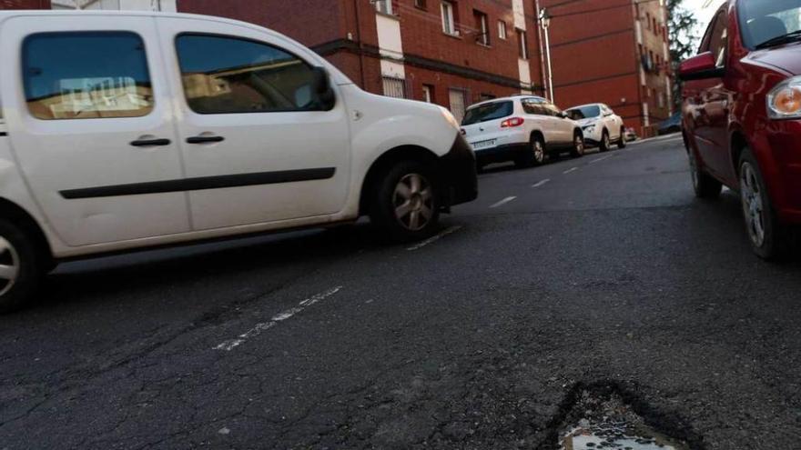 Quejas por los baches en San José Artesano