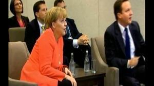 Merkel, Cameron y fútbol