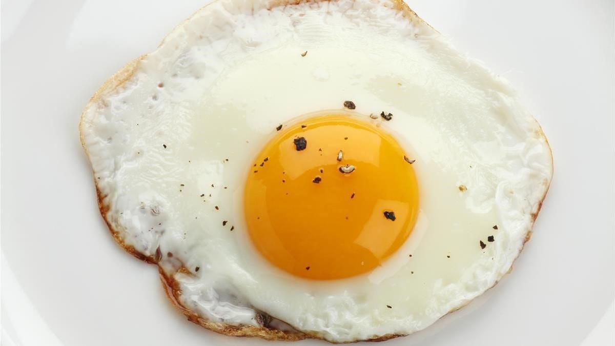 Huevos Y Harina De Libro De Recetas En Blanco Abierto Imagen de