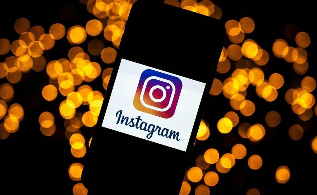 (FILES) This file picture taken on September 28 2020 shows the logo of the social network Instagram on a smartphone in Toulouse southwestern France - Officials representing most US states on May 10 2021 called on Facebook chief Mark Zuckerberg to nix plans to launch a version of Instagram for children In a letter to the founder and chief of the leading social network 44 state attorneys general argued that such a service would be harmful for myriad reasons (Photo by Lionel BONAVENTURE AFP) (FILES) This file picture taken on September 28 2020 shows the logo of the social network Instagram on a smartphone in Toulouse southwestern France - Officials representing most US states on May 10 2021 called on Facebook chief Mark Zuckerberg to nix plans to launch a version of Instagram for children In a letter to the founder and chief of the leading social network 44 state attorneys general argued that such a service would be harmful for myriad reasons (Photo by Lionel BONAVENTURE AFP)