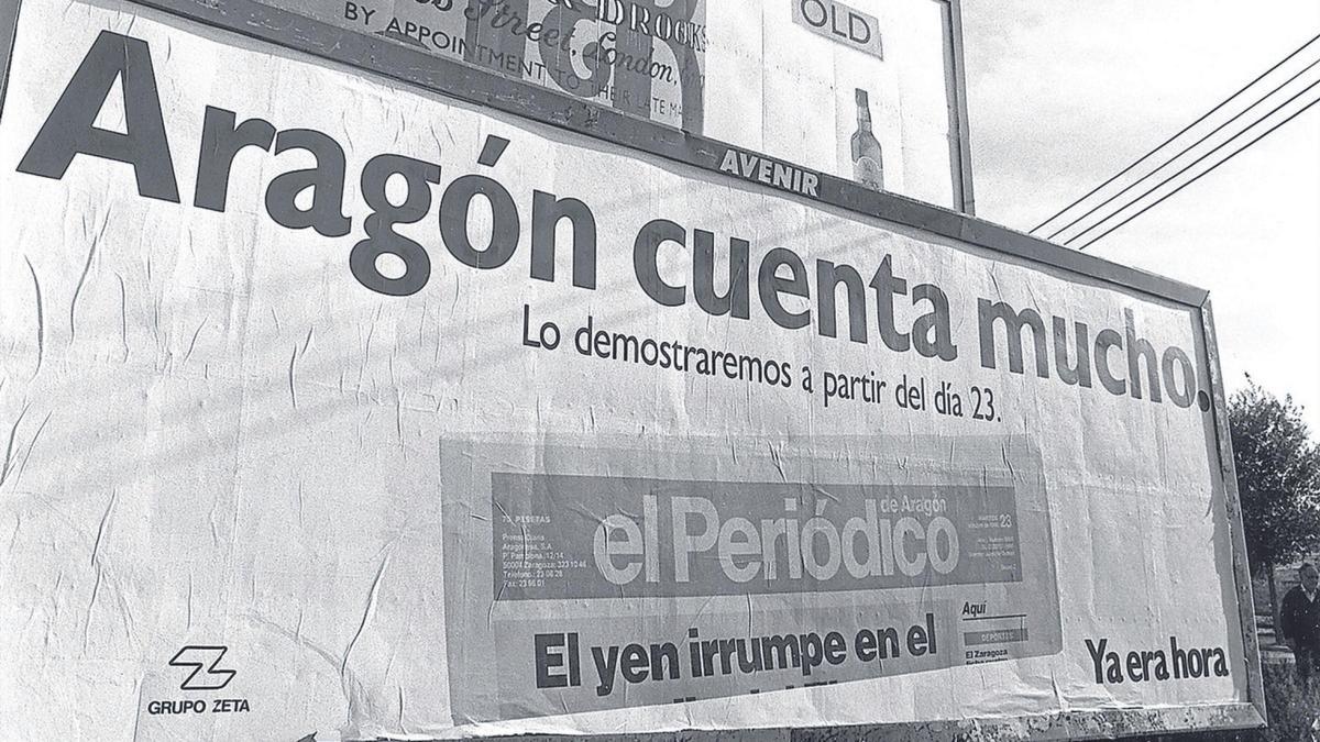 Pancarta en Zaragoza anunciando la llegada de El Periódico de Aragón