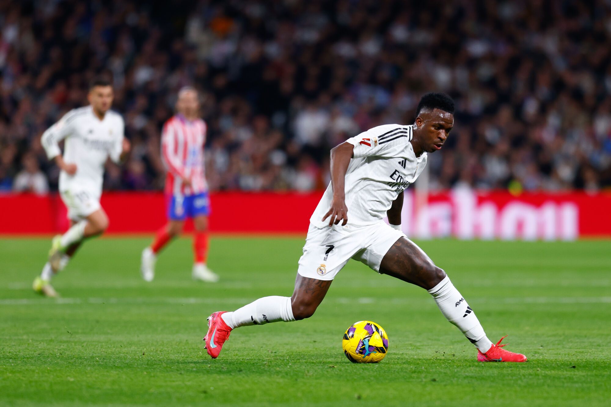 Vinicius Junior of Real Madrid in action during the Spanish League, LaLiga EA Sports, football match played between Real Madrid and Atletico de Madrid at Santiago Bernabeu stadium on February 8, 2025, in Madrid, Spain. AFP7 08/02/2025 ONLY FOR USE IN SPAIN. Dennis Agyeman / AFP7 / Europa Press;2025;SPAIN;SPORT;ZSPORT;SOCCER;ZSOCCER;Real Madrid v Atletico de Madrid - LaLiga EA Sports;