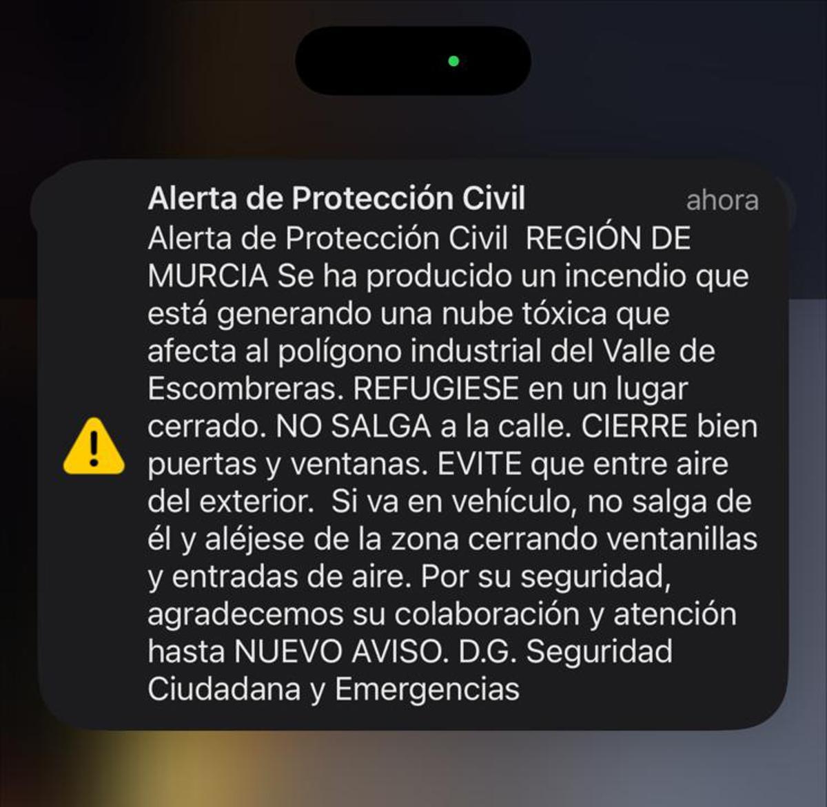 Mensaje recibido por los vecinos de las poblaciones cercanas a Escombreras a través de una alerta en sus teléfonos móviles mediante el sistema ES-Alert