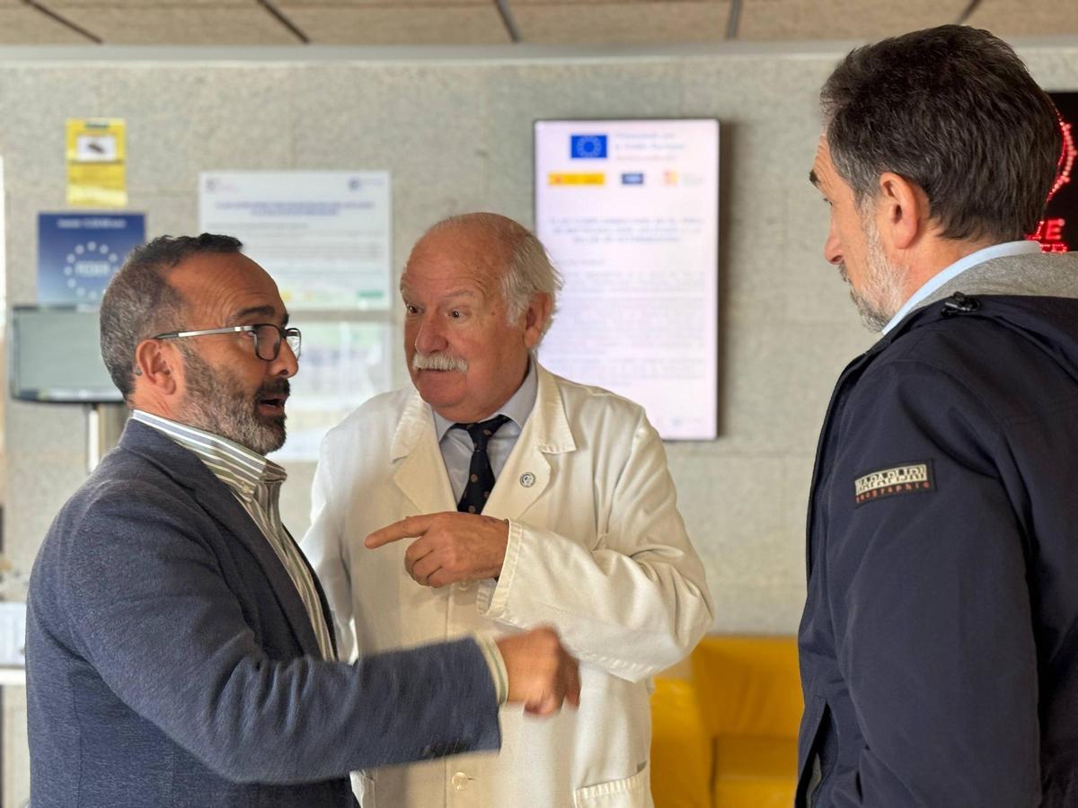 Moales junto a Usón.