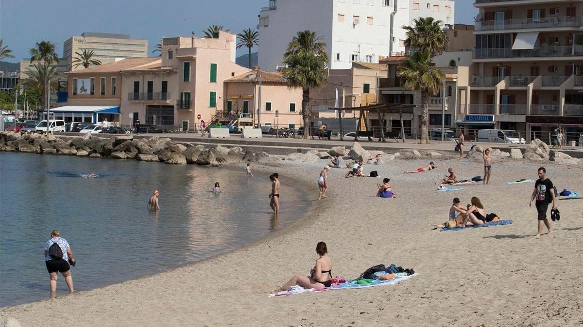 mdedios53527097 people sunbathe at portixol beach in palma de mallorca on ma200530141043