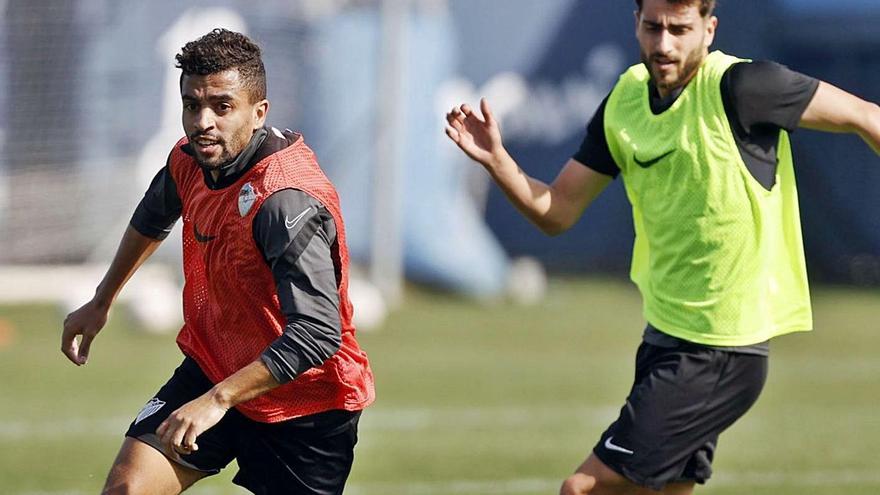 Benkhemassa y Luis Muñoz, durante el entrenamiento de ayer.