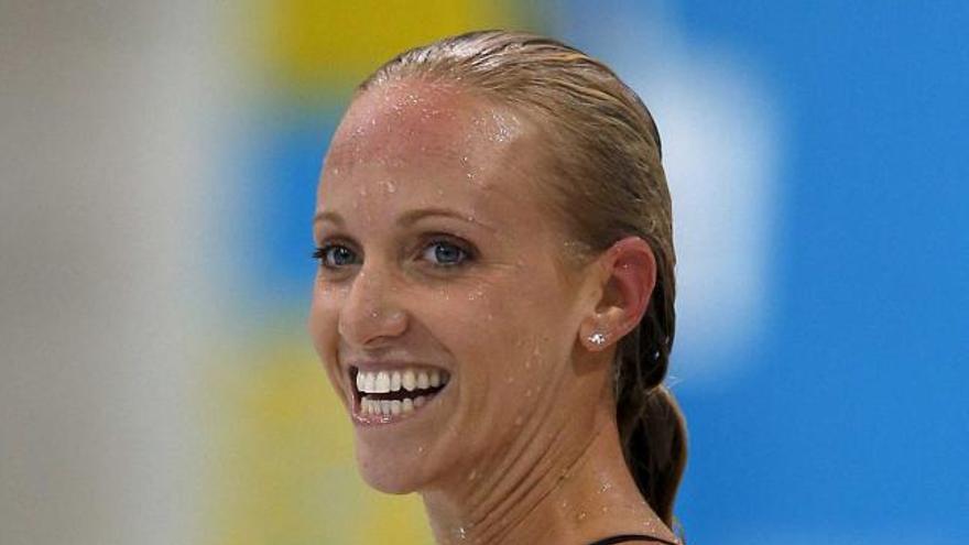 Dana Vollmer, oro con récord del mundo en los 100 metros mariposa.