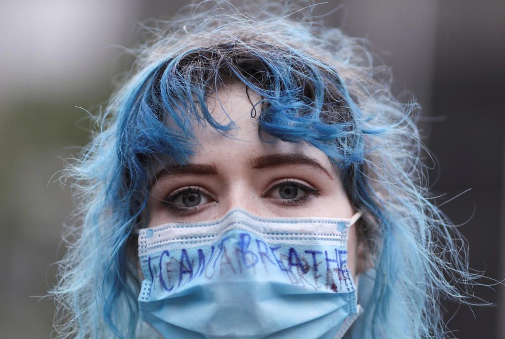 Demonstrators protest in the aftermath of the ...