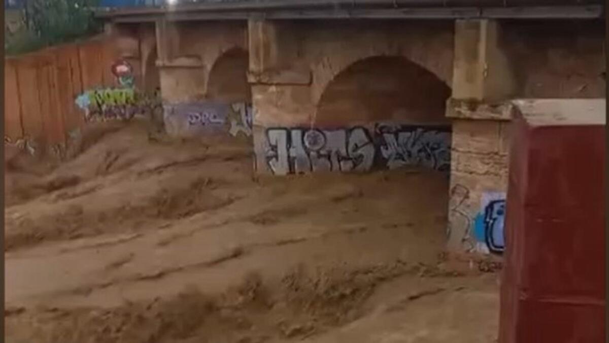 Temporal en Valencia | La rambla del Poyo, al límite, y las calles de Massanassa completamente anegadas