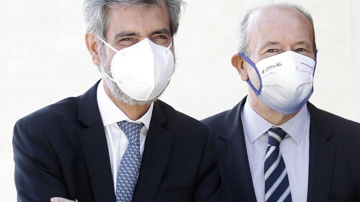 El presidente del Supremo y del Consejo del Poder Judicial, Carlos Lesmes, junto al ministro de Justicia, Juan Carlos Campo, el pasado 25 de septiembre en Barcelona, en la entrega de nuevos despachos judiciales.