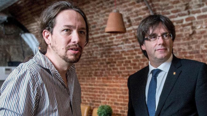 Puigdemont desvela que Pablo Iglesias le llamó para hablar de la moción