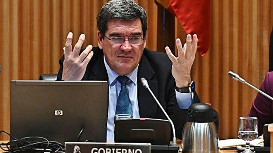 El ministro de Seguridad Social, José Luis Escrivá, comparece, ayer, en la Comisión de Trabajo del Congreso.