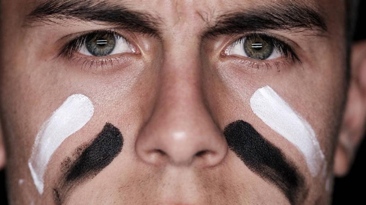 Dybala, con la cara pintada con los colores de su equipo